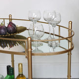 Golden Glamour Oval Drinks Trolley With Mirrored Elegance